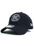 【送料無料】REIGNING CHAMP NEW ERA 9TWENTY CREST CAP NAVY