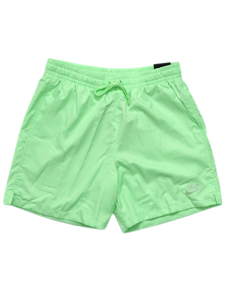 green nike shorts