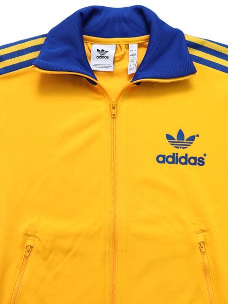 yellow adidas track top